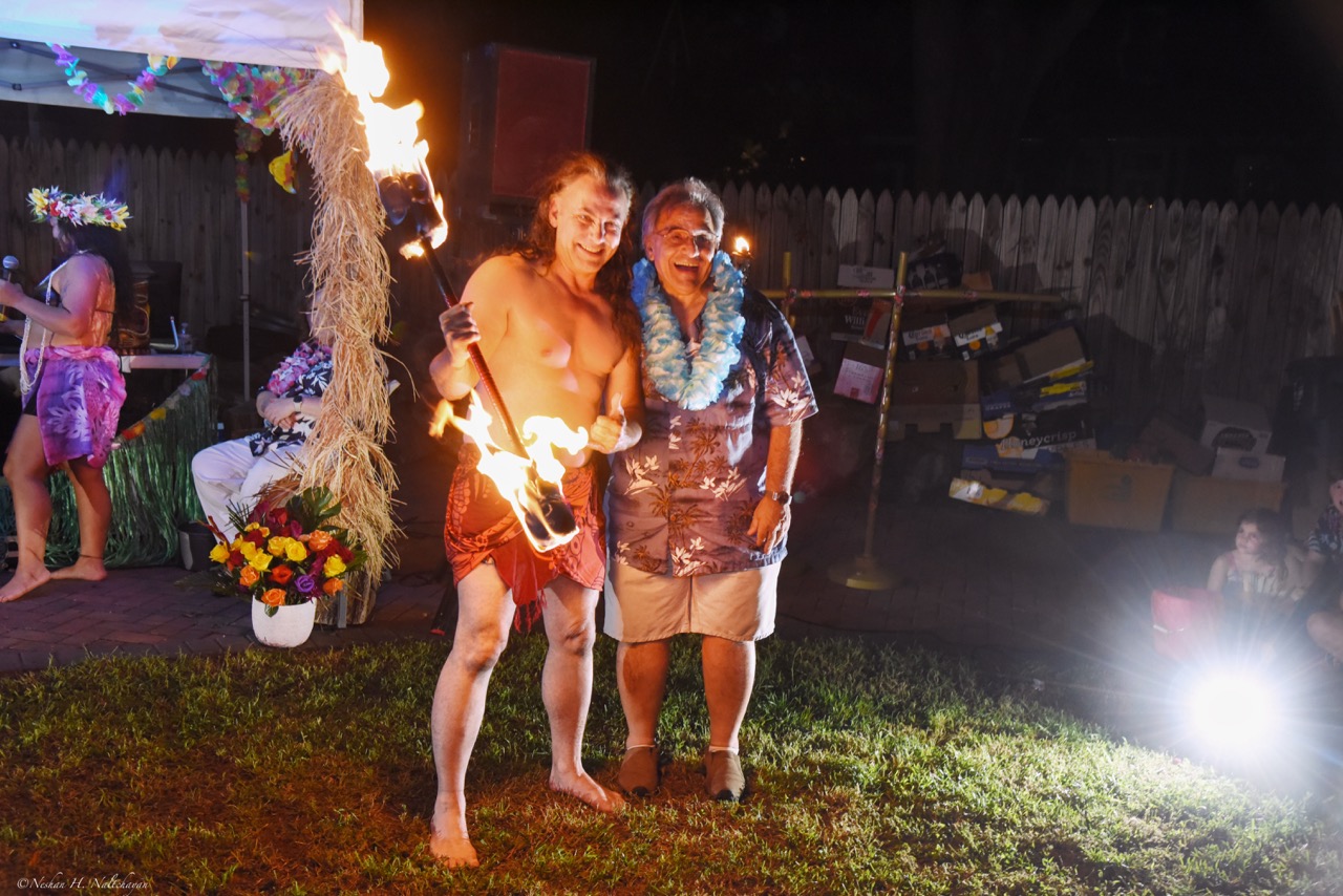 Guests celebrating at the 24th Annual Michael D. Herman & Associates Luau
