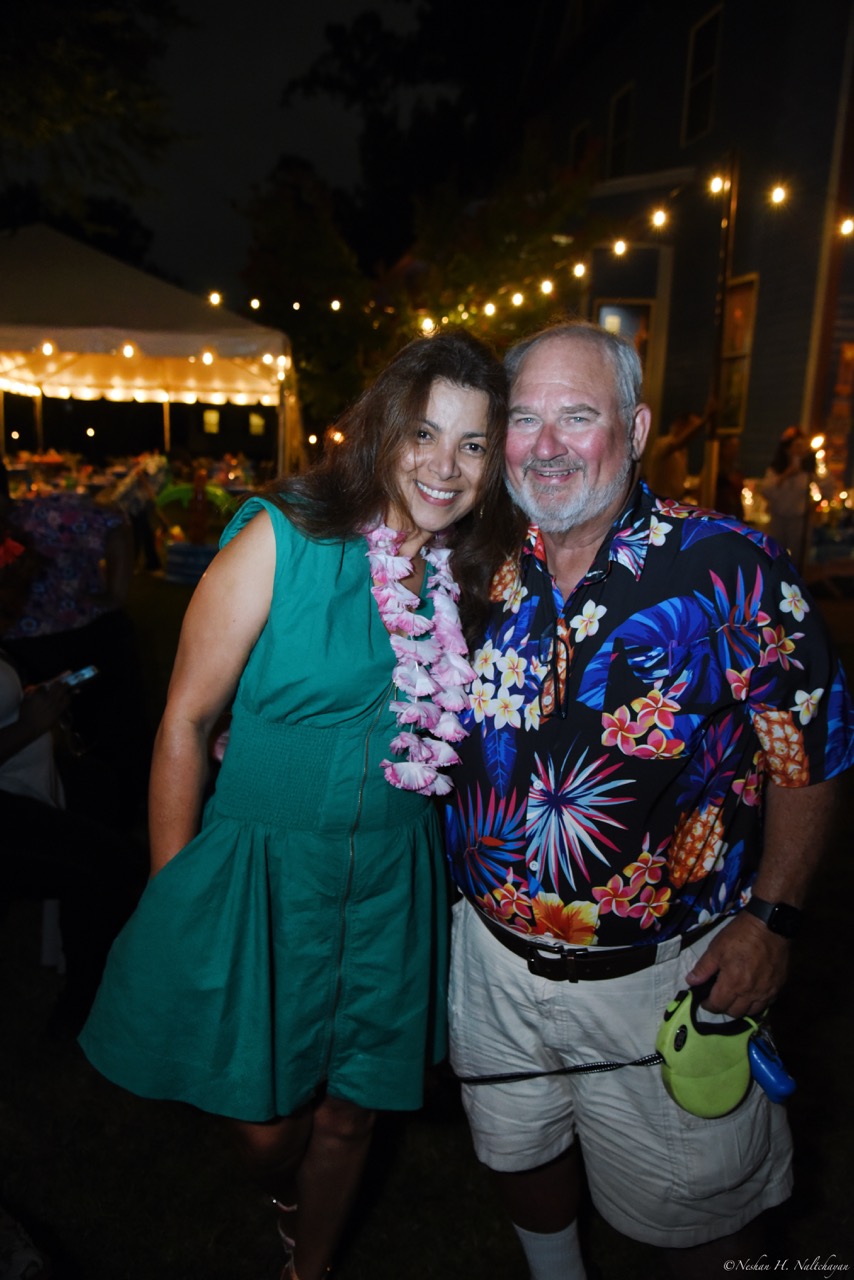 Guests celebrating at the 24th Annual Michael D. Herman & Associates Luau