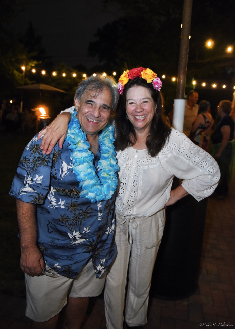 Guests celebrating at the 24th Annual Michael D. Herman & Associates Luau