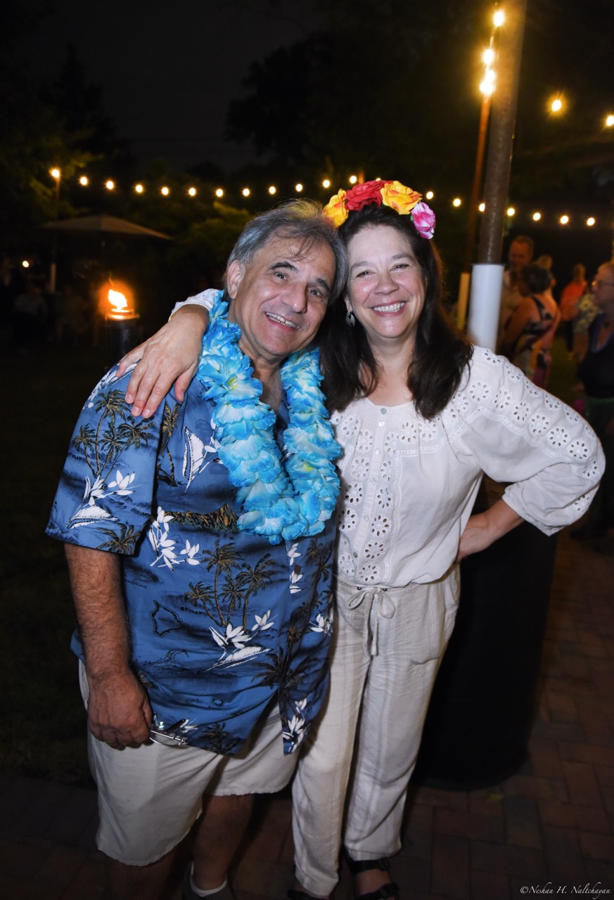 Guests celebrating at the 24th Annual Michael D. Herman & Associates Luau
