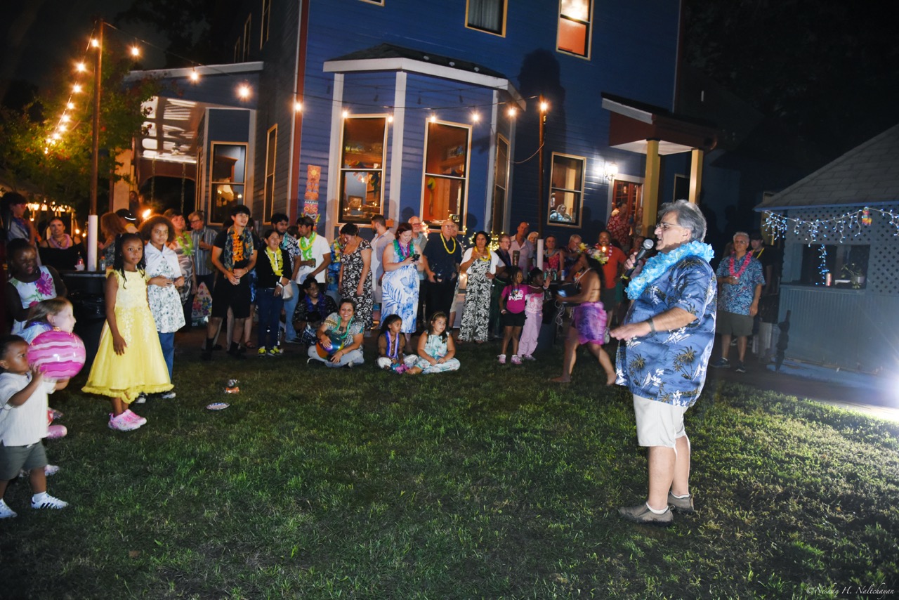 Guests celebrating at the 24th Annual Michael D. Herman & Associates Luau