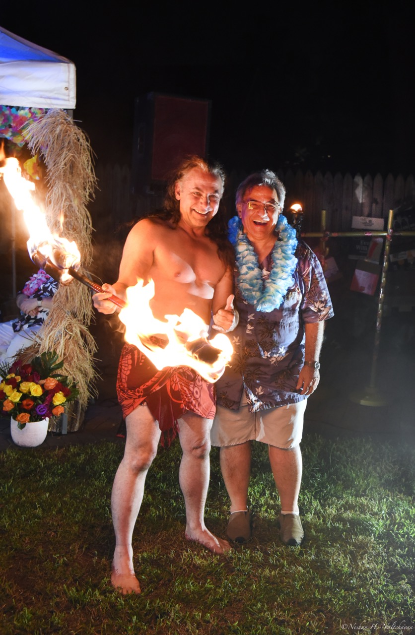 Guests celebrating at the 24th Annual Michael D. Herman & Associates Luau